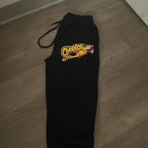 Black Cheetos, flaming, hot, sweatpants size small